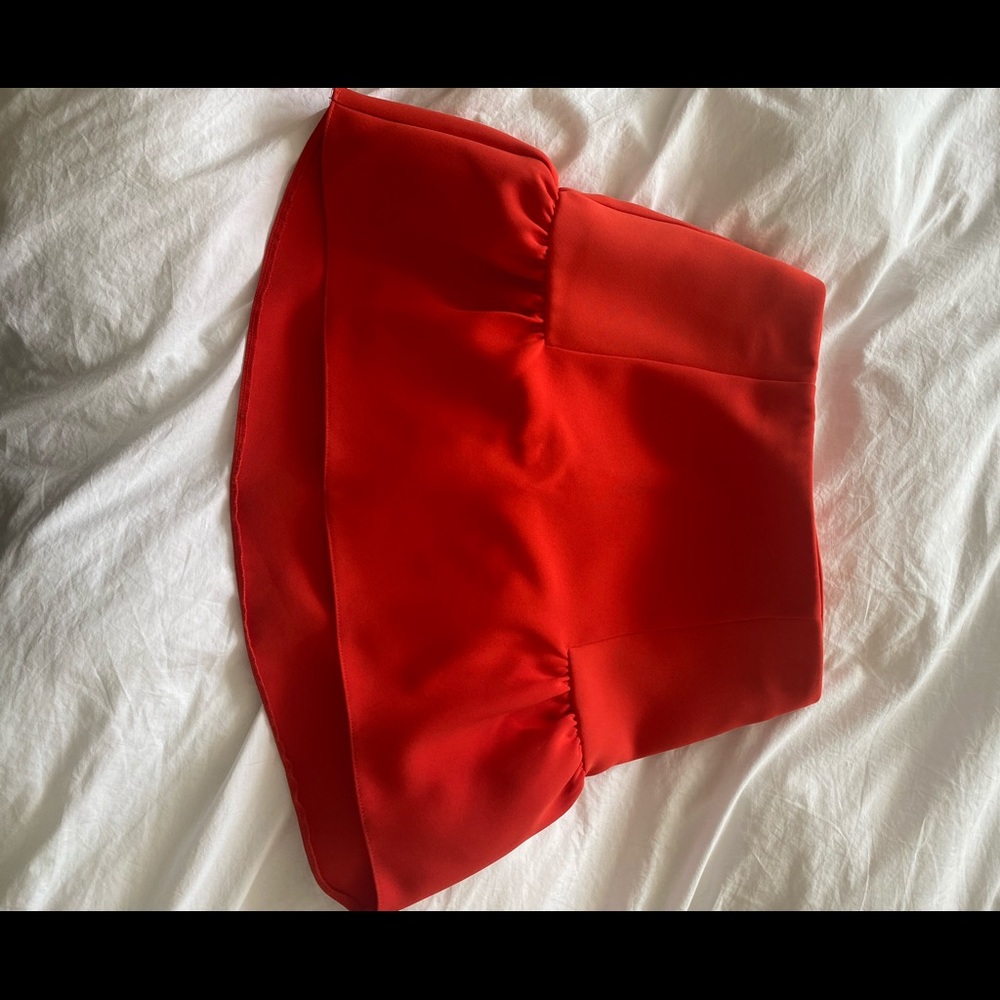 Bright poppy red peplum skirt